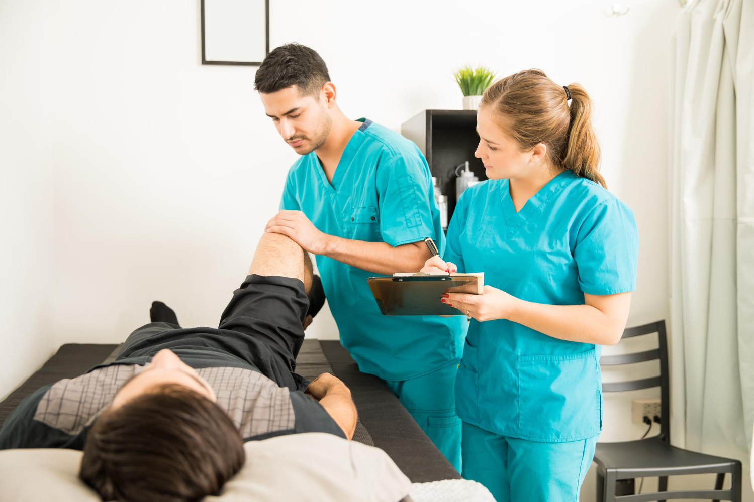 Chiropractor in Tinley Park observing patient's condition.