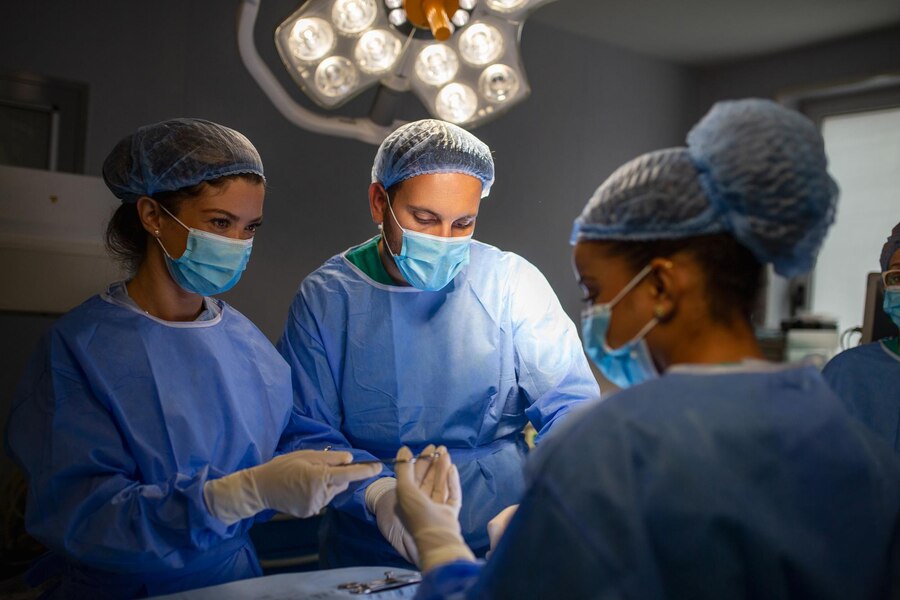 urgical-team-performing-surgery-modern-operation-theaterteam-doctors-concentrating-patient-surgeryteam-doctors-working-together-surgery-operating-room