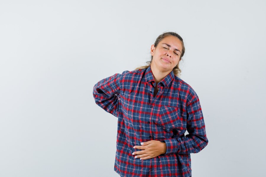young-woman-checked-shirt-having-bellyache-looking-exhausted